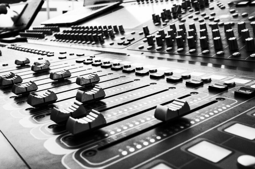 Mixing console faders in a recording studio, reopened for a mix recall after final delivery
